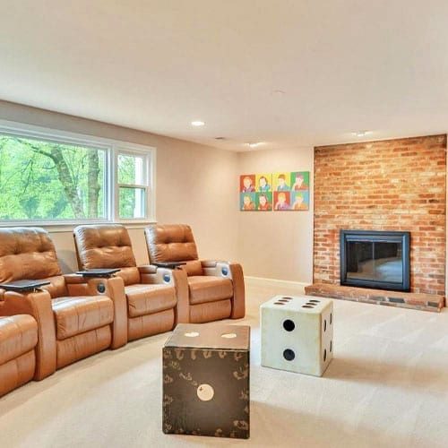Home staging turns cold uninviting basement into amazing family media room